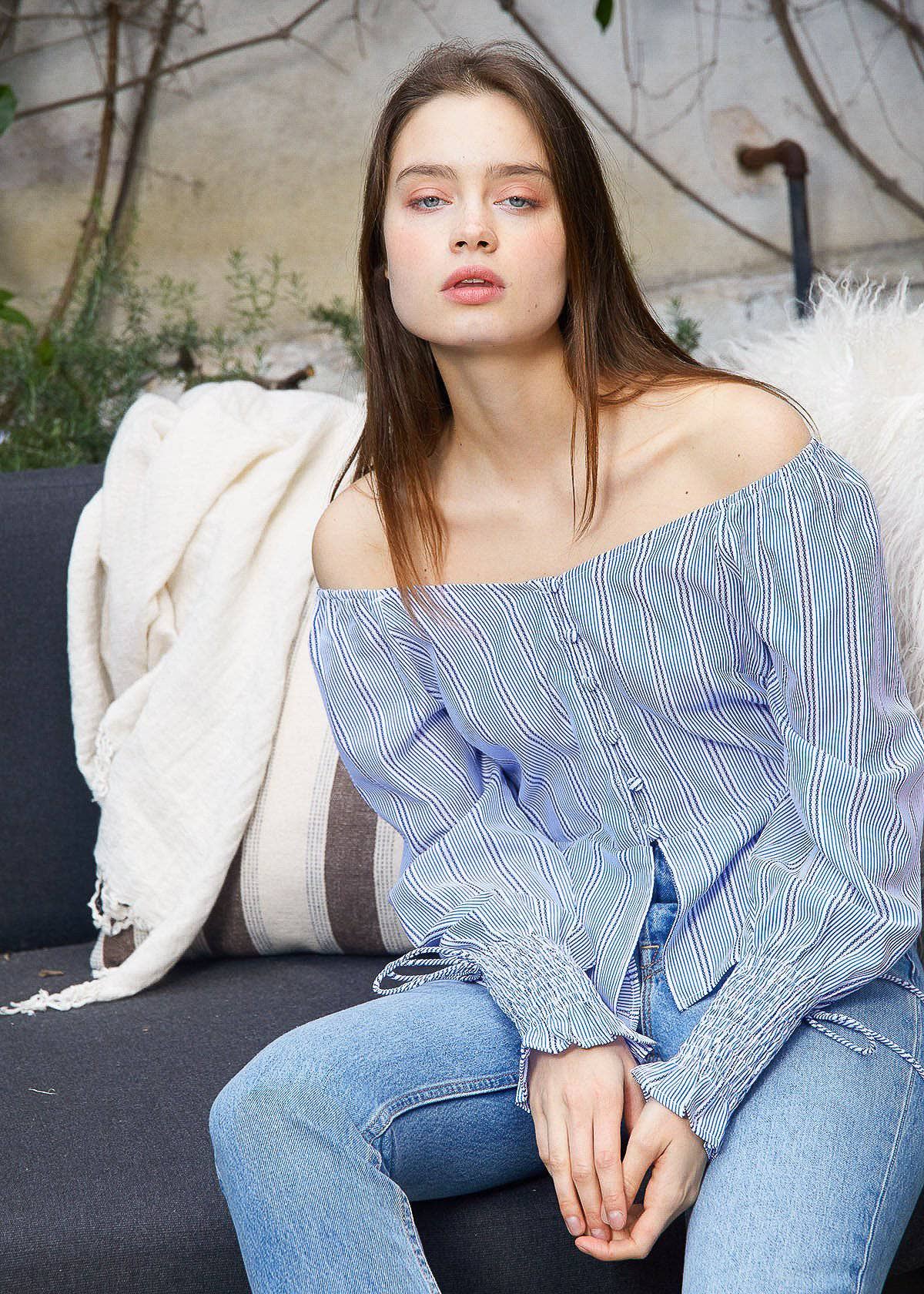 Nurode's Smocked Cuff Button Front Peplum Blouse in Blue