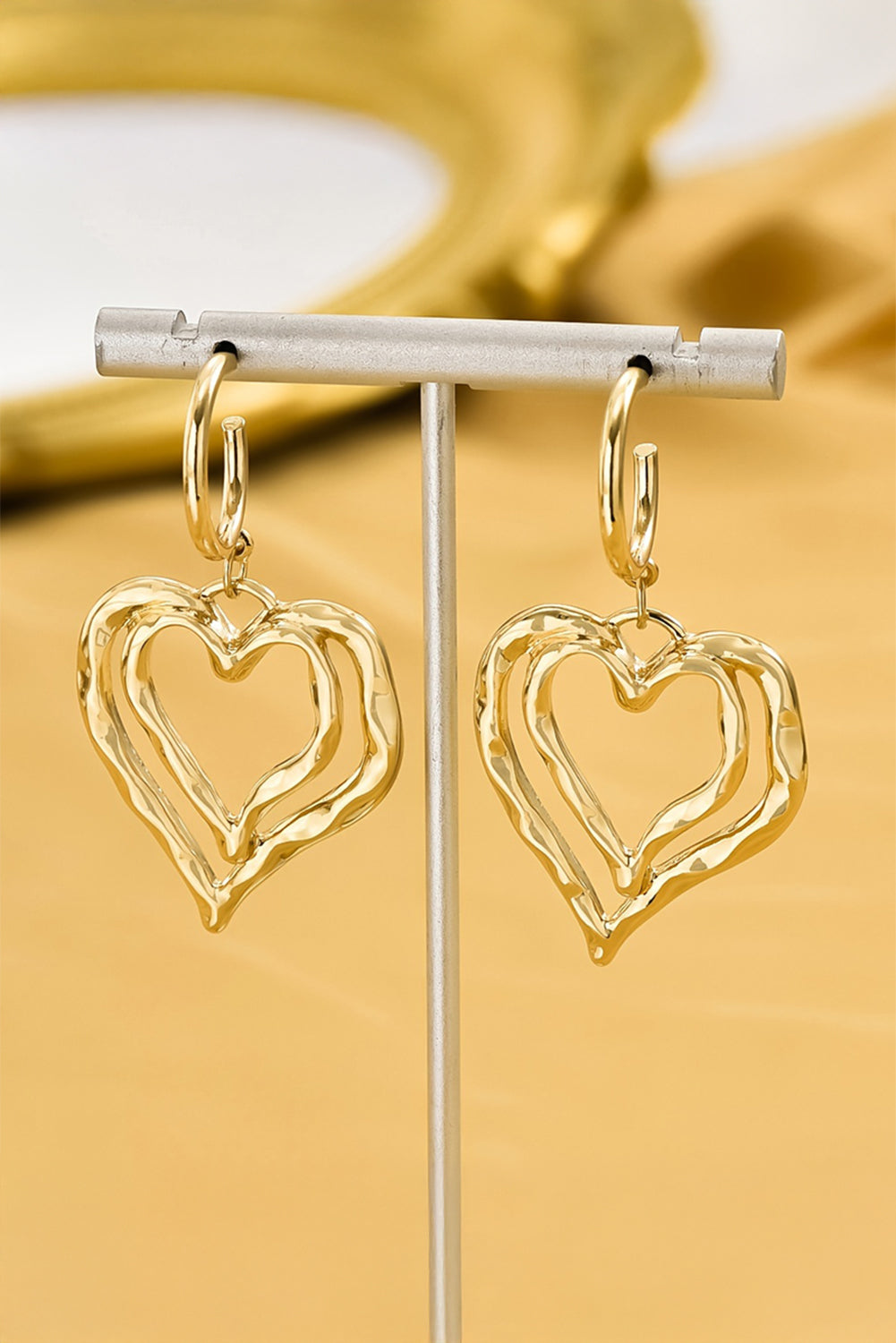 Gold double heart earrings