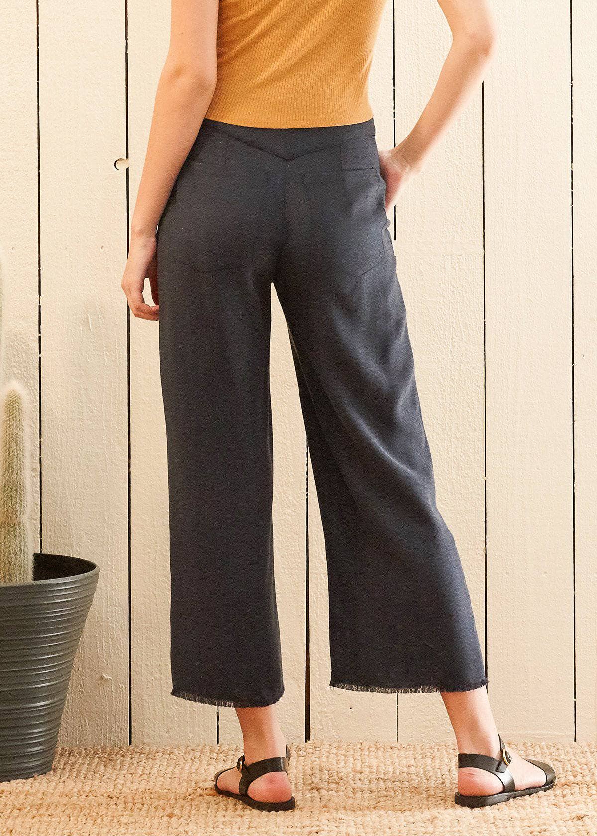 Nurode's Fringe Hem Cropped Pants in Navy