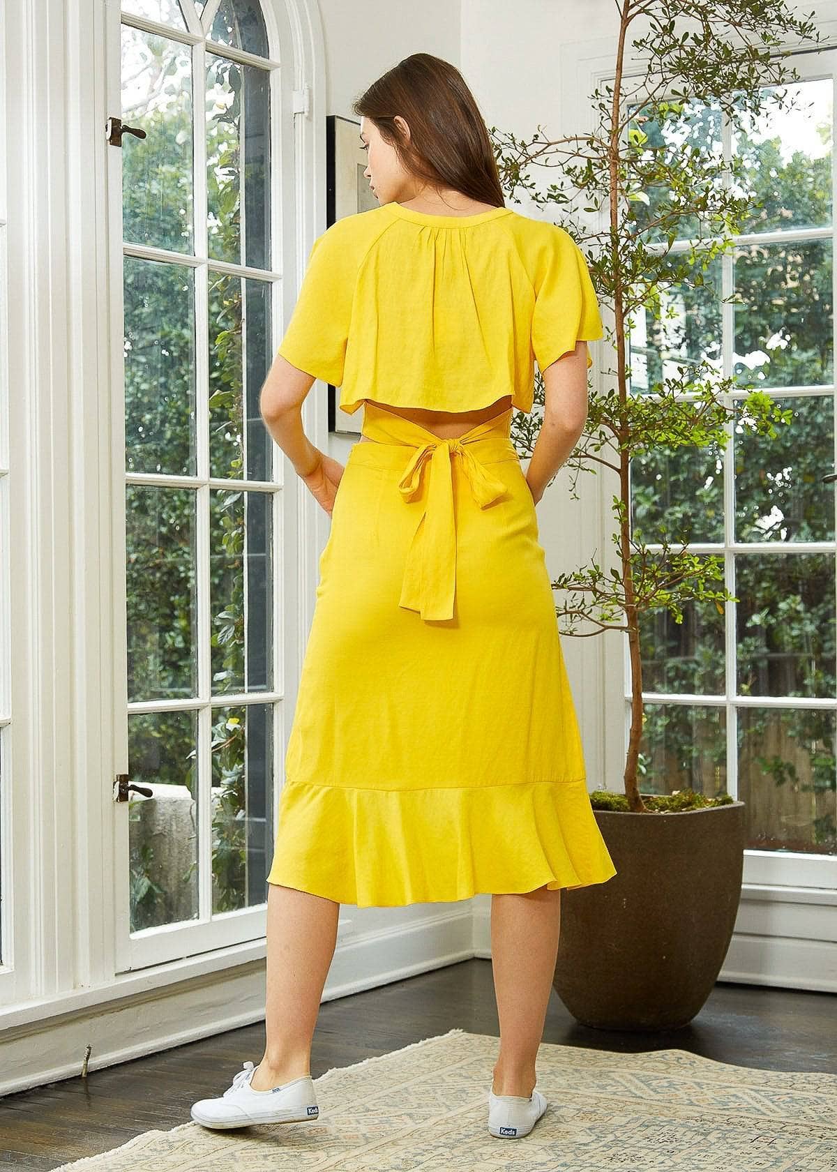 Nurode's Asymmetrical Hem Button Front Skirt in Yellow
