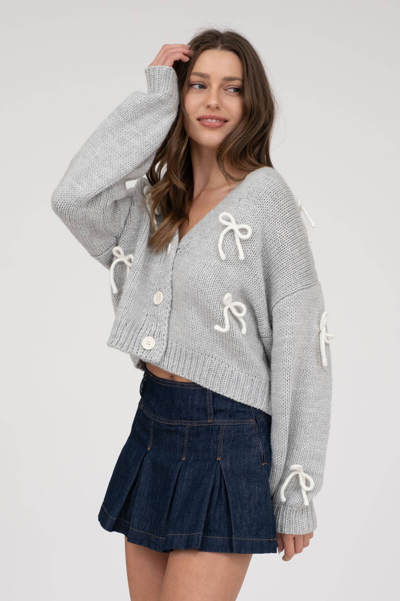 BOW DETAIL BUTTON DOWN CROPPED KNIT CARDIGAN