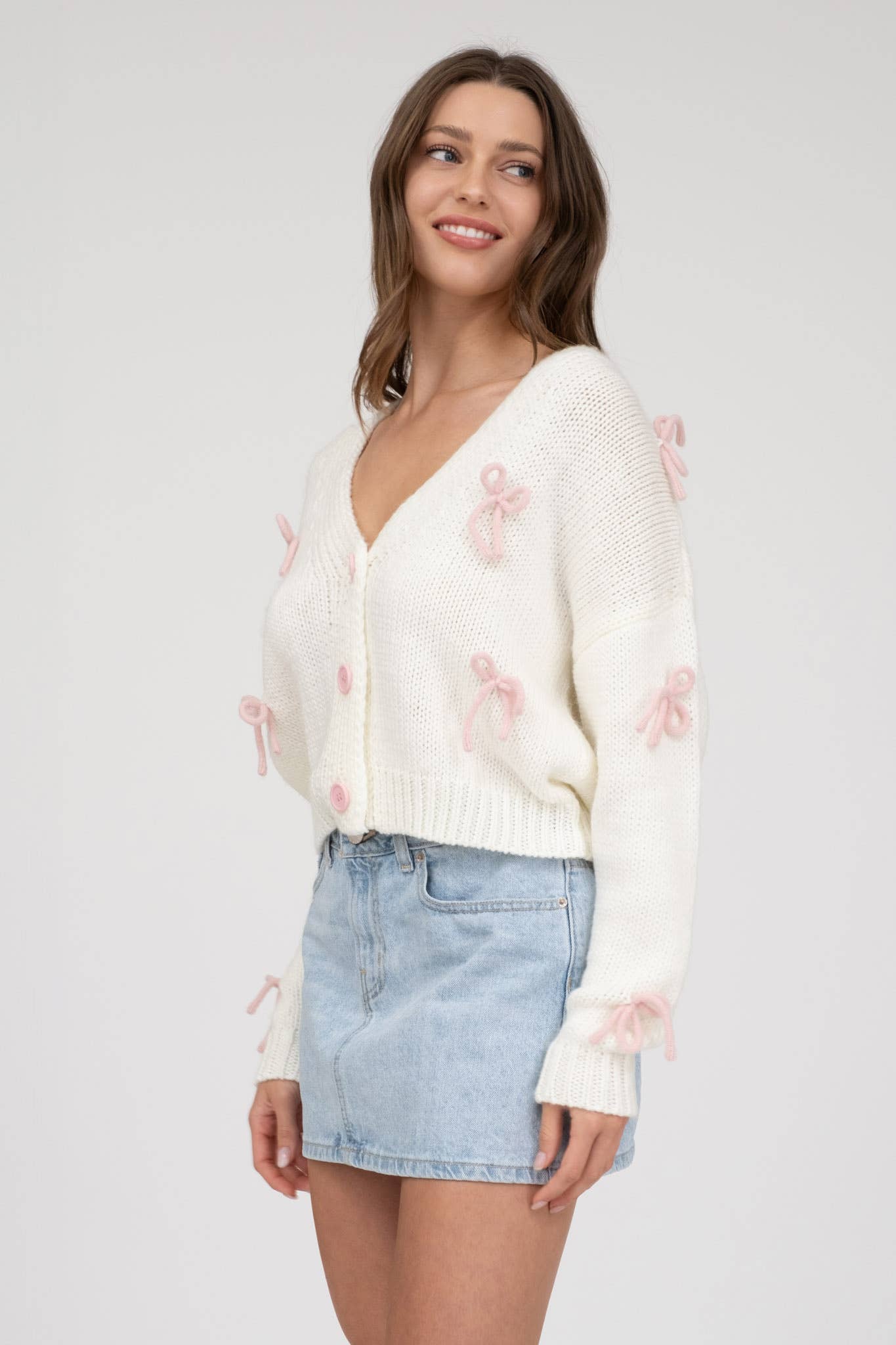 BOW DETAIL BUTTON DOWN CROPPED KNIT CARDIGAN
